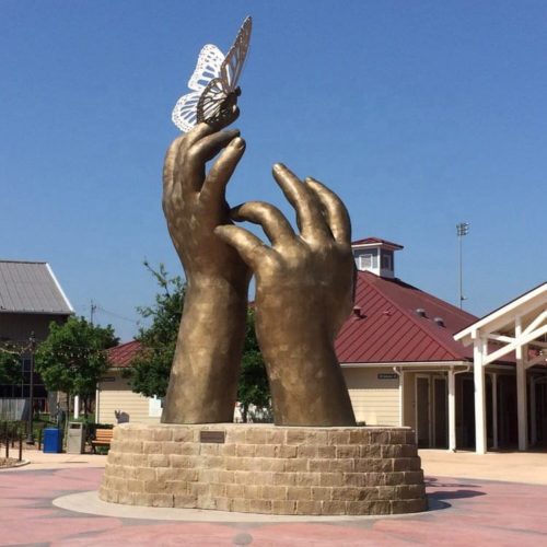 Famous Outdoor And Garden Decor "Butterfly On Hands" Metal Bronze Hands Sculpture