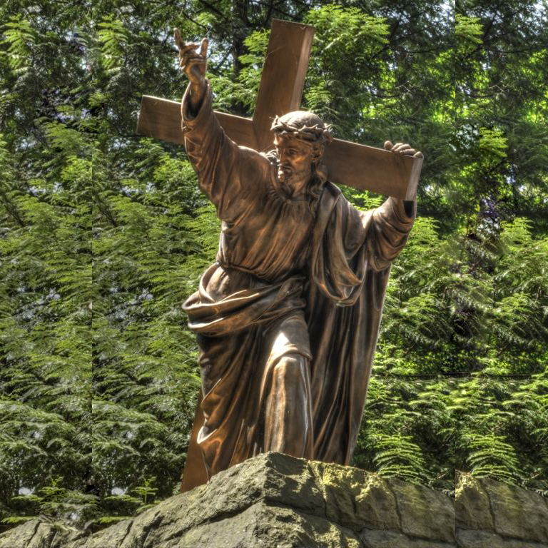 Jesus carrying cross sculpture